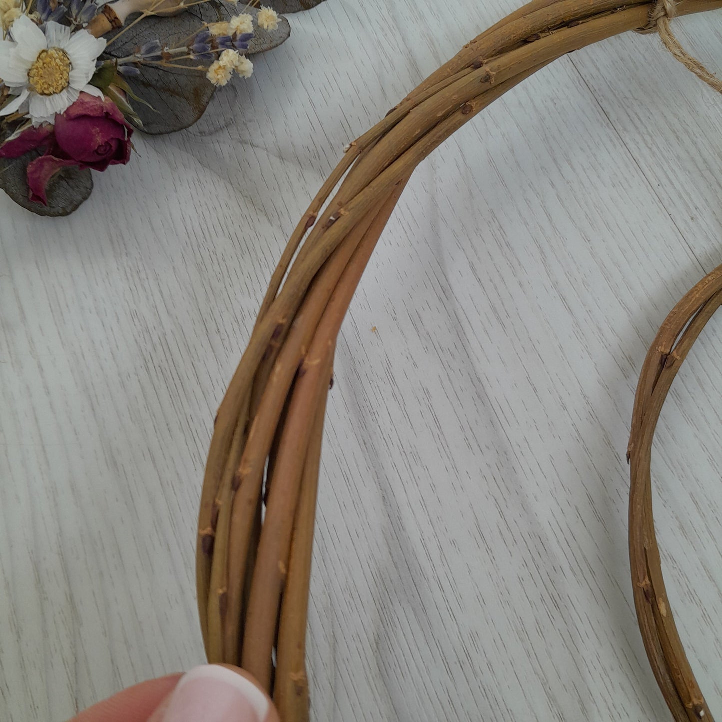 Brown willow hoops for floristry and crafts, double hoop thin wreath base. Wicker hoop in a hoop, hanging willow rings.