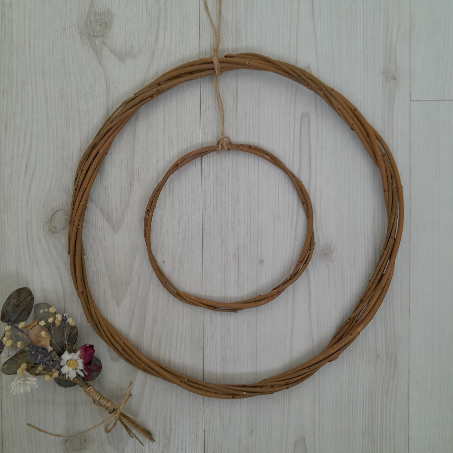 Brown willow hoops for floristry and crafts, double hoop thin wreath base. Wicker hoop in a hoop, hanging willow rings.