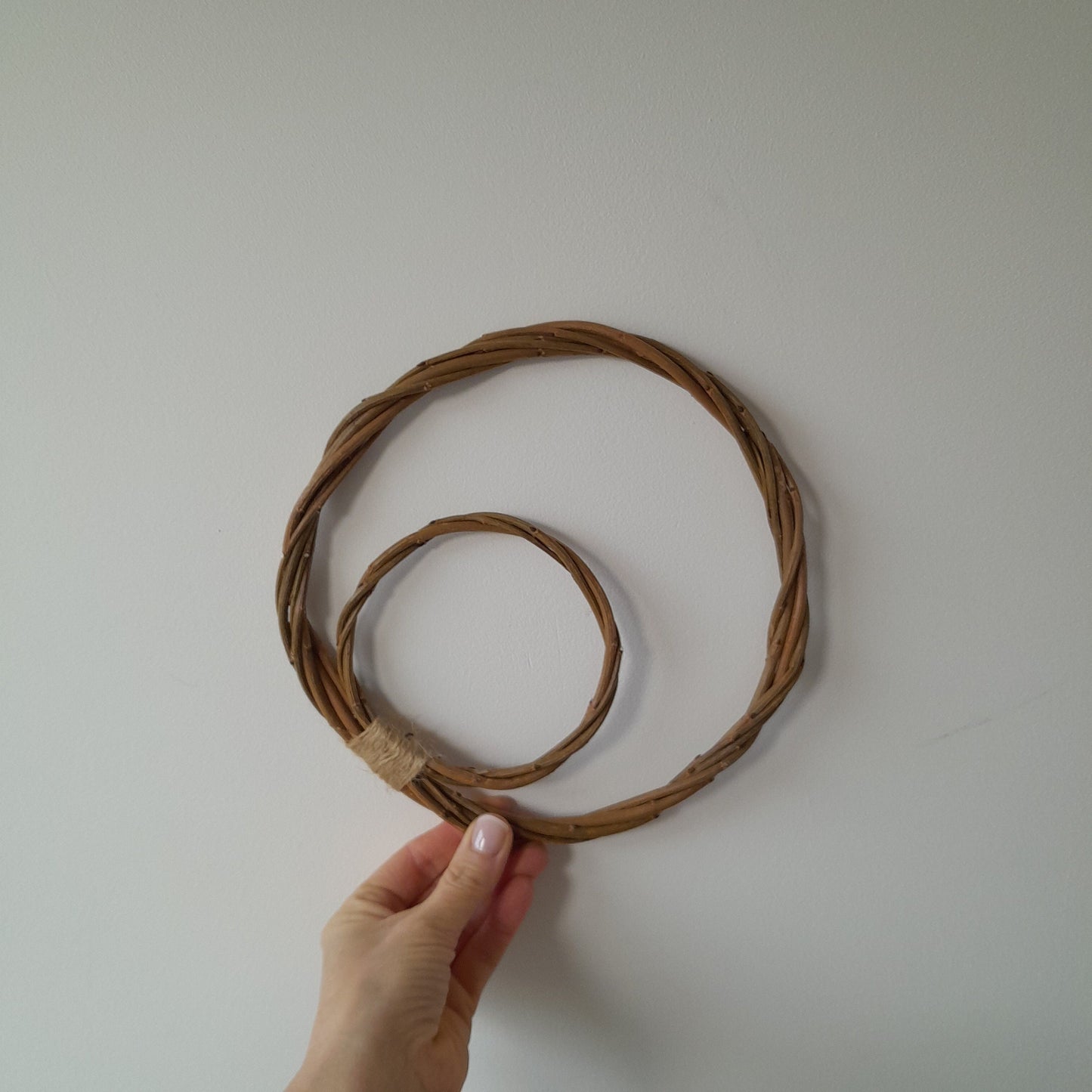 Brown willow hoops for floristry and crafts, double hoop thin wreath base. Wicker hoop in a hoop, hanging willow rings.