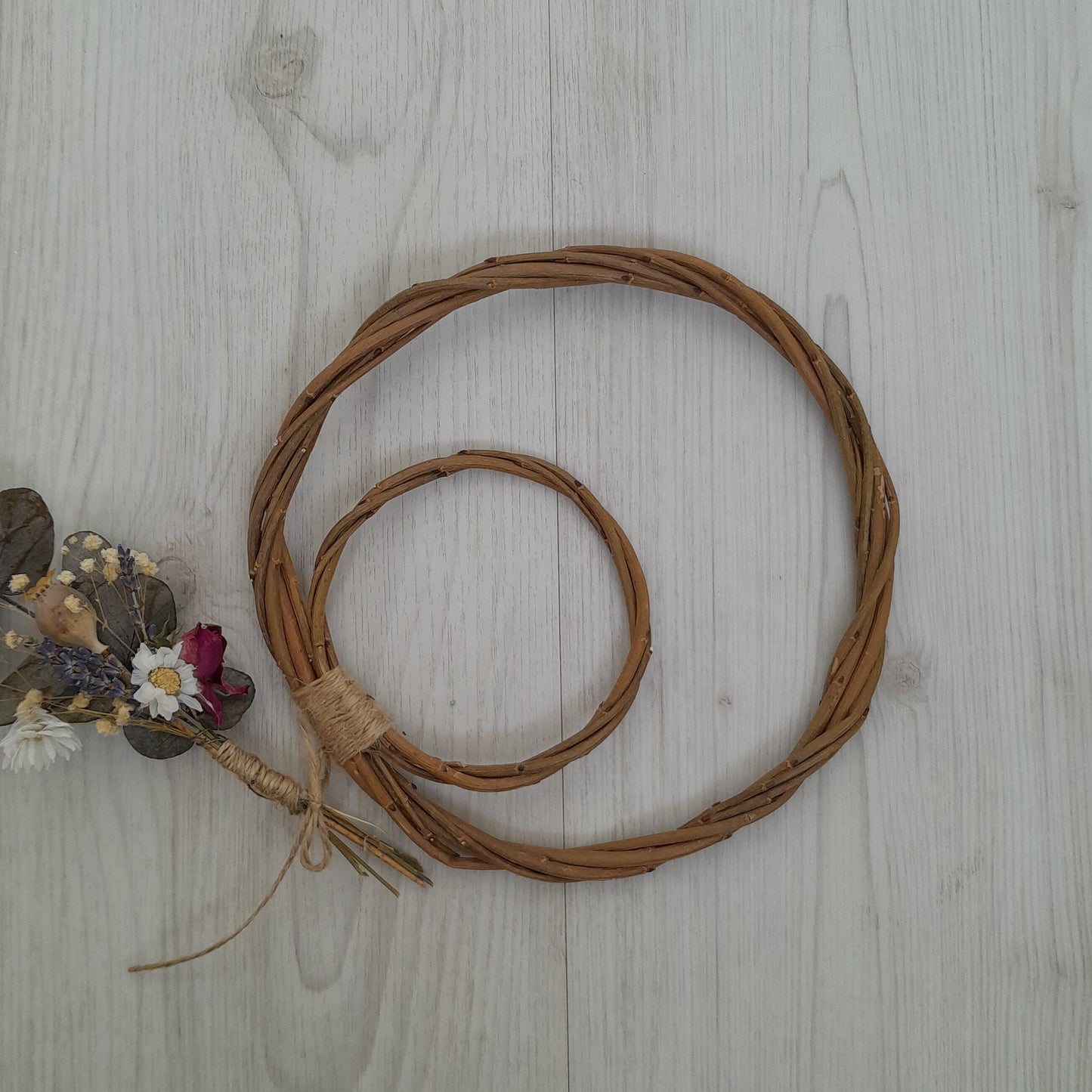Brown willow hoops for floristry and crafts, double hoop thin wreath base. Wicker hoop in a hoop, hanging willow rings.
