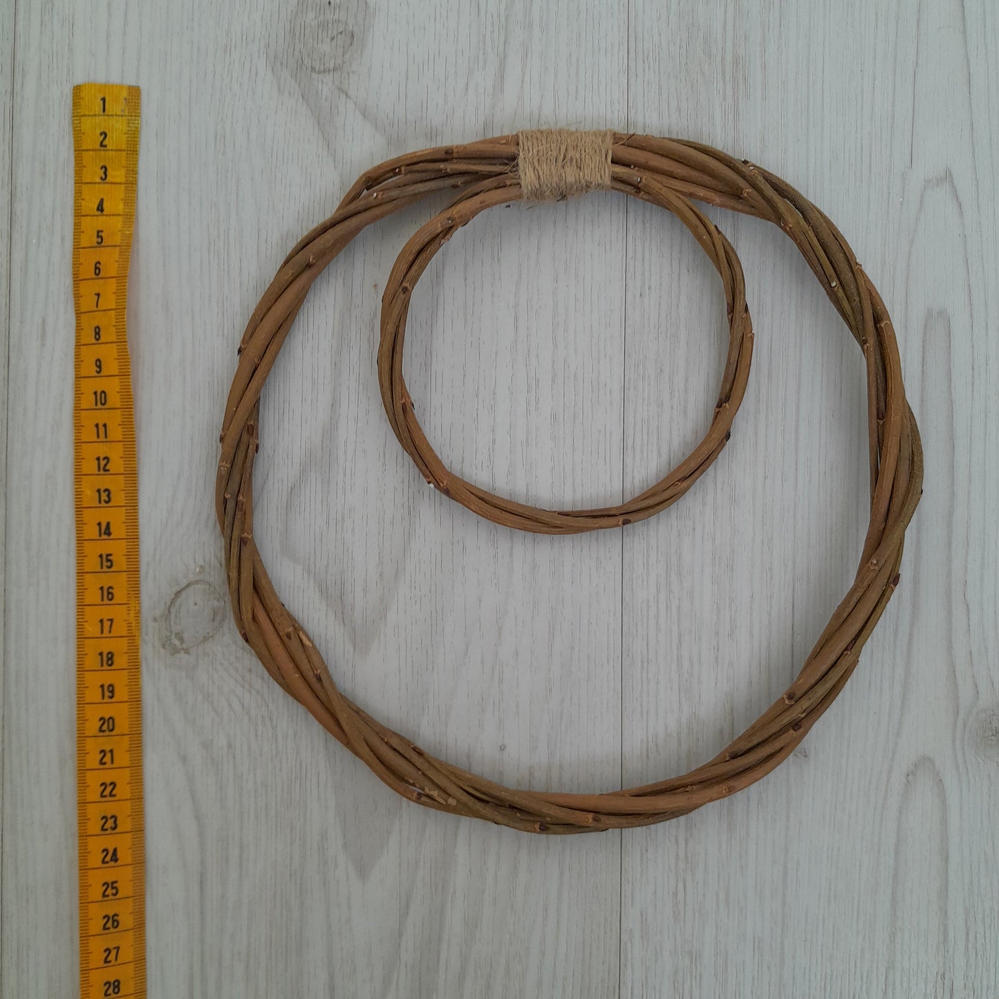 Brown willow hoops for floristry and crafts, double hoop thin wreath base. Wicker hoop in a hoop, hanging willow rings.