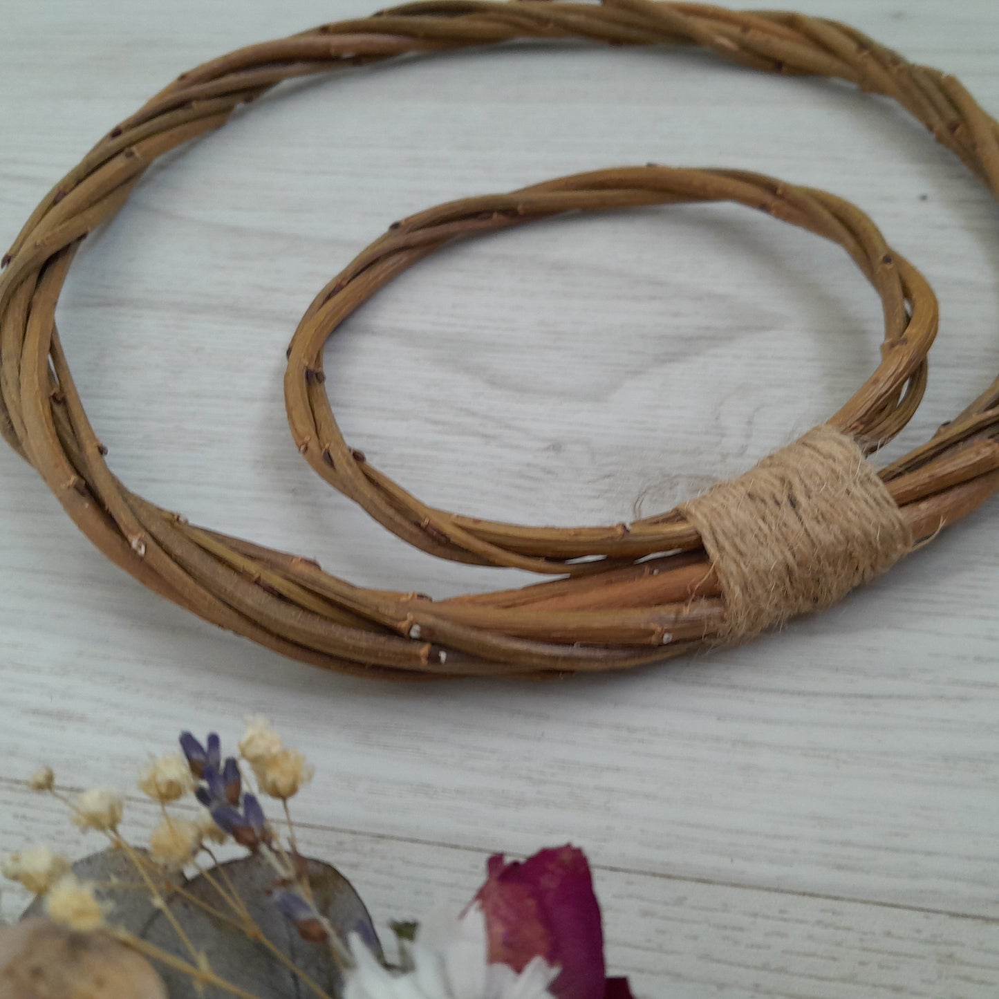 Brown willow hoops for floristry and crafts, double hoop thin wreath base. Wicker hoop in a hoop, hanging willow rings.