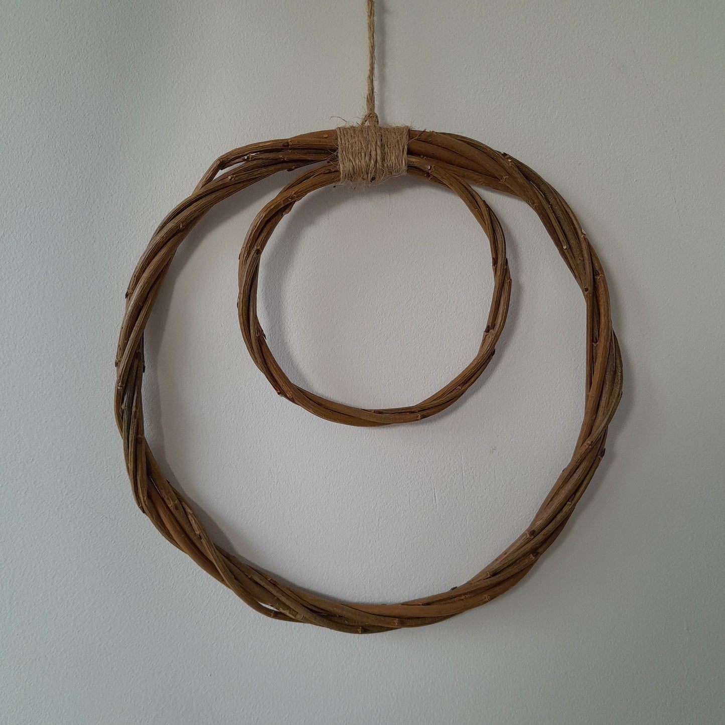 Brown willow hoops for floristry and crafts, double hoop thin wreath base. Wicker hoop in a hoop, hanging willow rings.